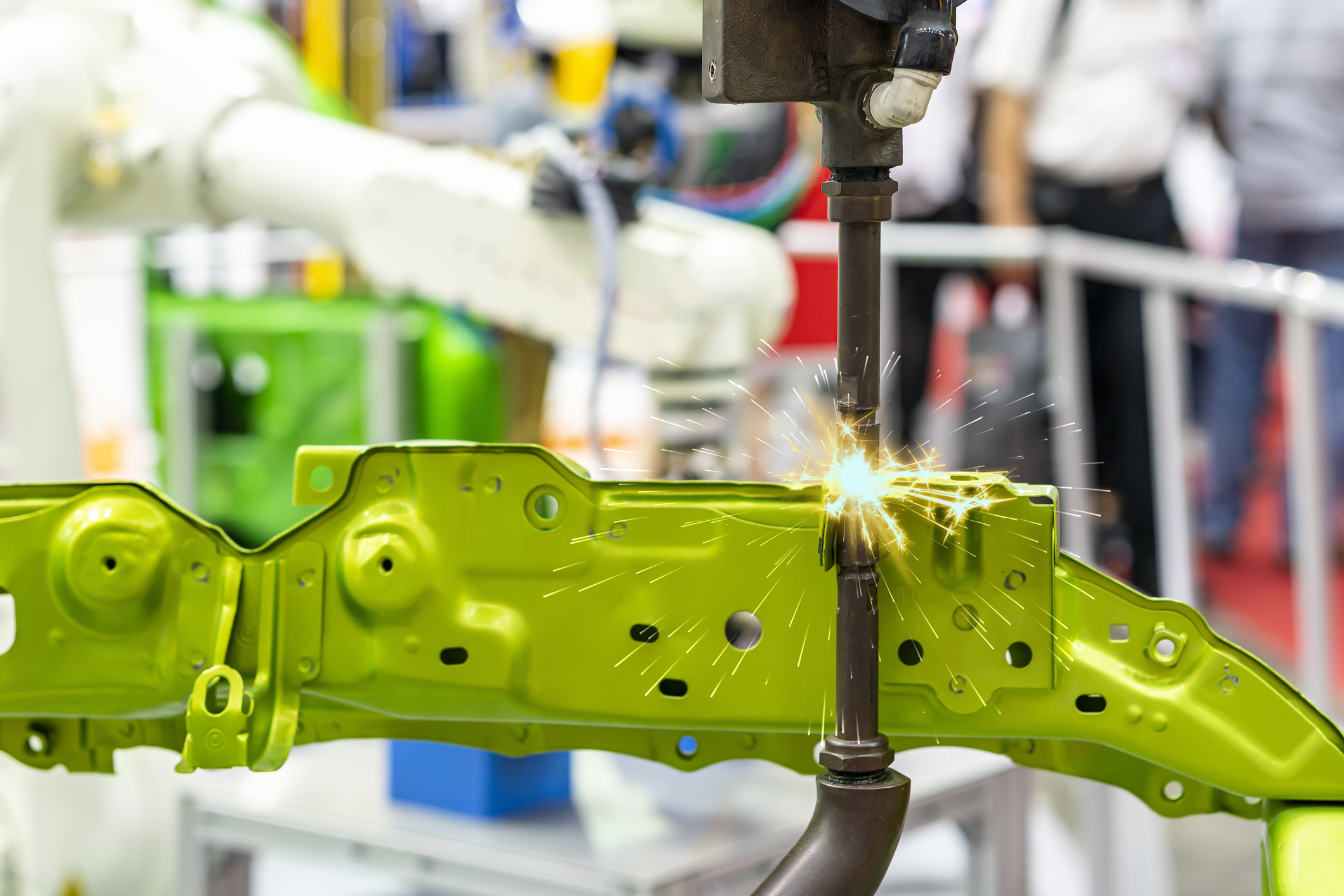 electrode resistance spot welding with robot during arc or spark for assembly body frame of automobile part in manufacturing process